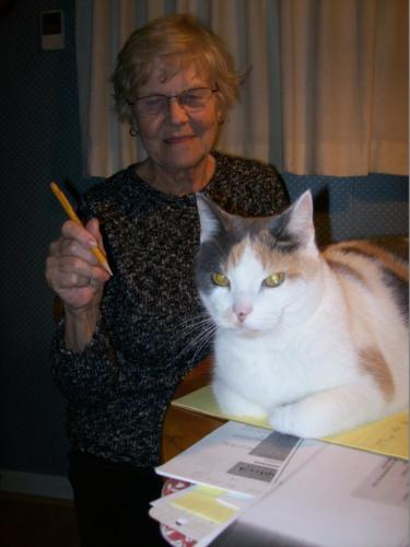 Lucky helping Liisa with her puzzles (2013?)